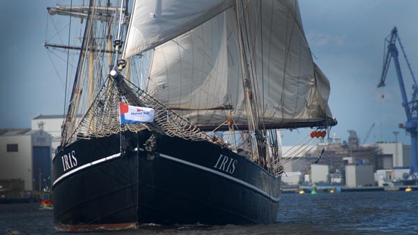 With the flag on the bow through the port of Rostock