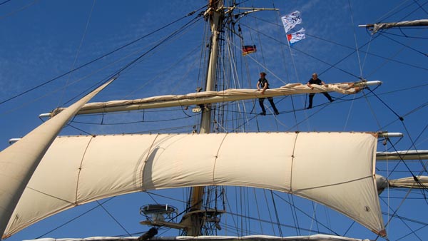 Furling the sails on "Gunilla"