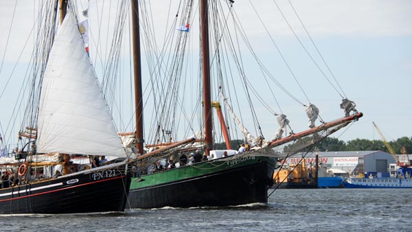 Traditional sailing ships on the river Warnow